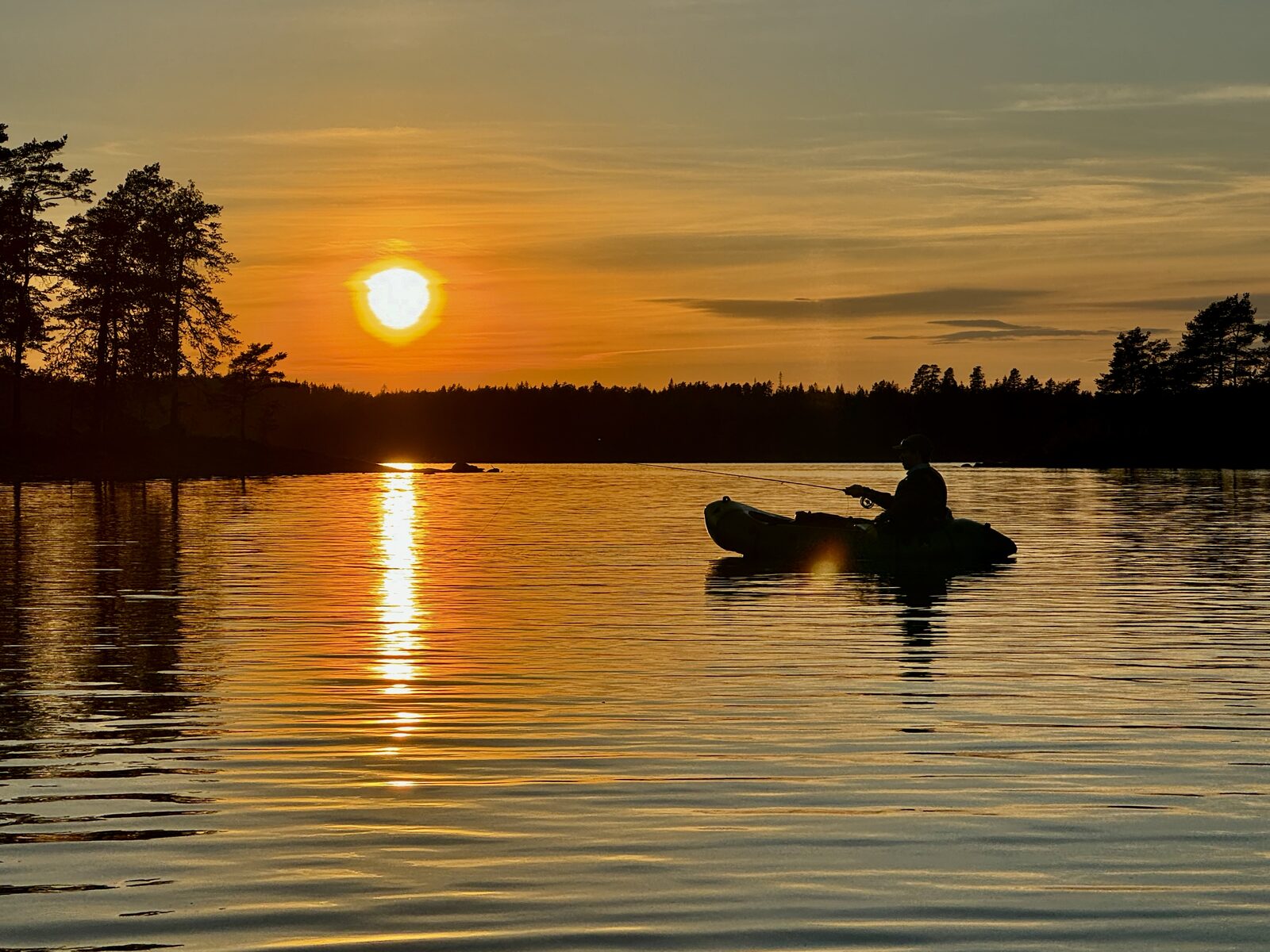 Kajakk i solnedgang